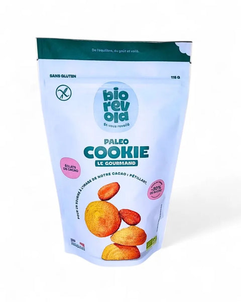 Sachet de Paleo Cookie Le Gourmand BioRévola 115g, biscuits bio sans gluten avec éclats de cacao pour un goûter sain.

